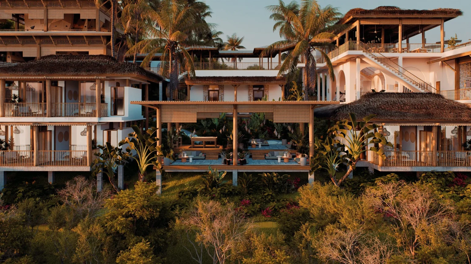 Buildings and pool among tropical gardens