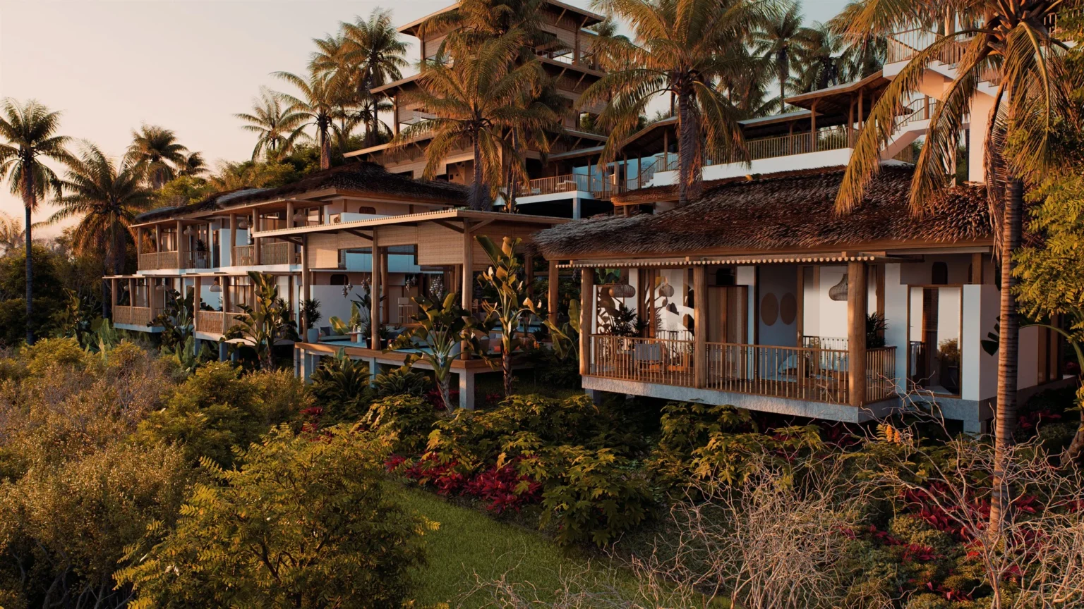 Buildings nestled in tropical gardens